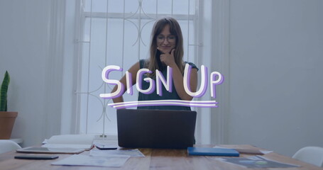 Image of sign up text over caucasian businesswoman using laptop in office