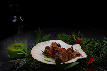 Exquisite seared scallop dish with vibrant greens and a touch of red. A symphony of flavors in a...