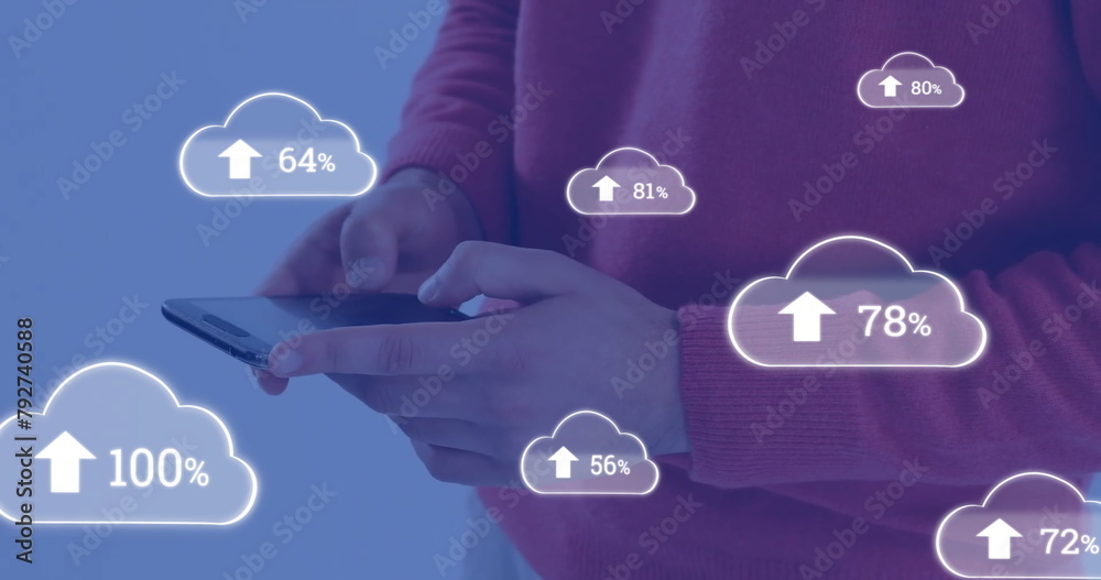 Poster image of cloud symbols uploading data over midsection of caucasian man using smartphone