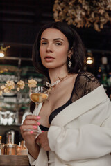 Woman in White Robe Holding Glass of Wine - Beautiful Celebration of Relaxation, Elegance, and Enjoyment