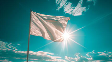 one white flag in front of a blue sky