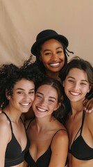 Obraz premium A group of women are smiling and posing for a photo