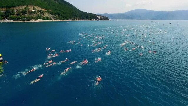 Swimming competition aerial view in mediterranean