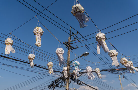 Lanterns and electricity cables in Pai in Mae Hong Son province, Thailand