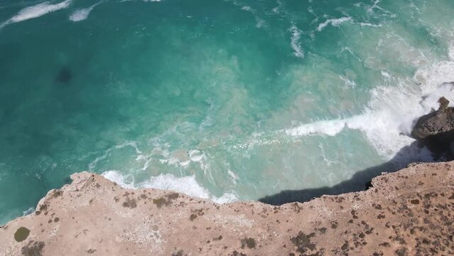 Drone aerial looking down into the Great Australian Bight with crashing waves