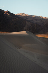 Fototapeta na wymiar Beatiful sunrise in the Mesquite Sand Dunes, in the Death Valley National Park, California