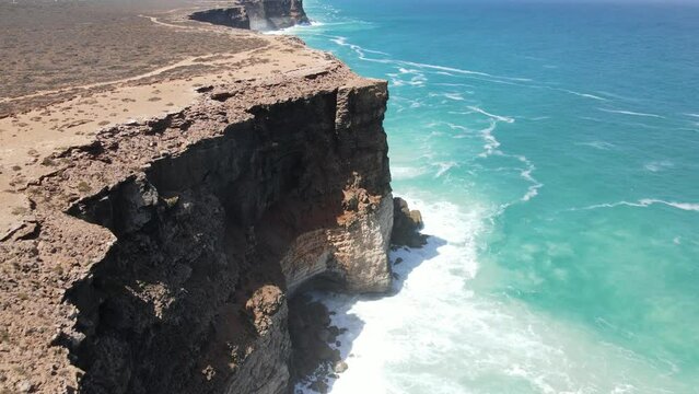Drone aerial over the Great Australian Bight pan down showing blue water.