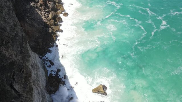 Drone aerial rising over the Great Australian Bight pan down showing blue water