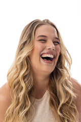 Caucasian plus size young female model laughing, radiating joy and positivity