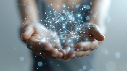 Abstract woman's hands holding atom symbol.