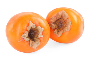 Delicious ripe juicy persimmons isolated on white
