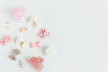 Set of trendy cute  accessories fot girl on white background. Hairstyles concept, top view, copy...