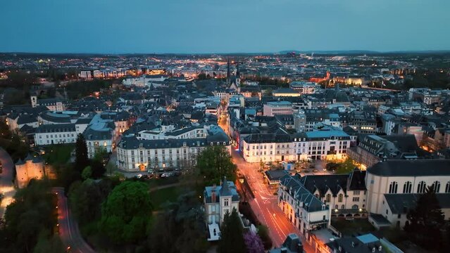 4K Aerial view of a Grand Duchy of Luxembourg , city skyline to night at Grund along Alzette river in the historical old town of Luxembourg