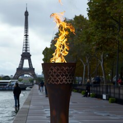 Olympic flame with the Eiffel Tower in the background. Olympic games. - obrazy, fototapety, plakaty