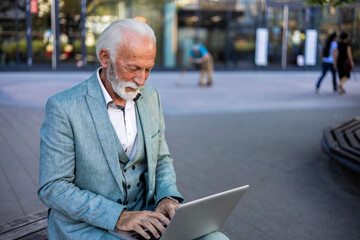 Travel, email and businessman with laptop in the city for communication and booking a flight...