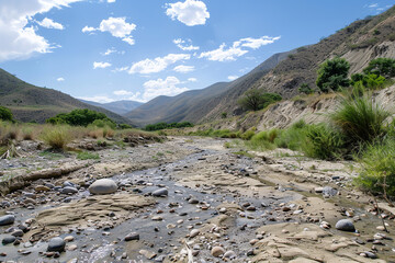 a dry riverbed in the mountains