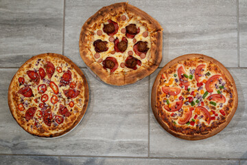 Mega Meat, Hot and Spicy and Vegetarian Pizzas