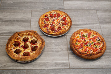 Mega Meat, Hot and Spicy and Vegetarian Pizzas