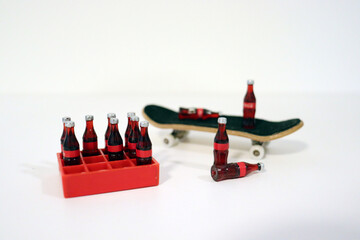 Wooden fingerboard at the ramp on table, close up. Mini skateboard, small skateboard deck