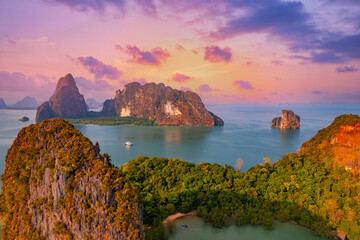 Sunset beautiful landscape of nature Thailand, Long tail boat with tourist on Hong tropical island and Phang Nga bay in turquoise sea, aerial view