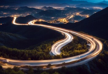 'light cars night road trails mountains curve panorama traffic transportation transport motion car speed fast blur movement abstract highway dark travel vehicle drive trail'