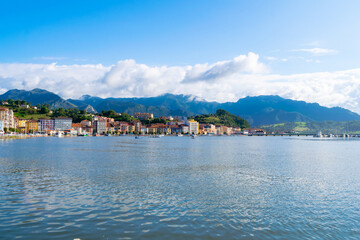 Majestic panoramic view of Ribadesella and the Sella estuary with the mountains in the background. Asturias - Spain