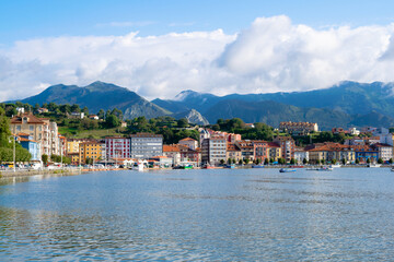 Fototapeta premium Ribadesella fishing village with the mountains in the background. Asturias - Spain