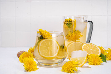 Dandelions cold iced tea or lemonade. Plant herbal flower drink with dandelions flowers and roots,...