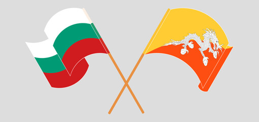 Crossed and waving flags of Bulgaria and Bhutan