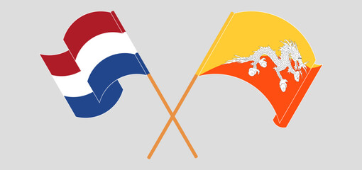 Crossed and waving flags of the Netherlands and Bhutan