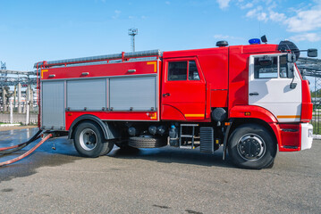A fire truck for the delivery of firefighters to the place of fire and the supply of extinguishing...