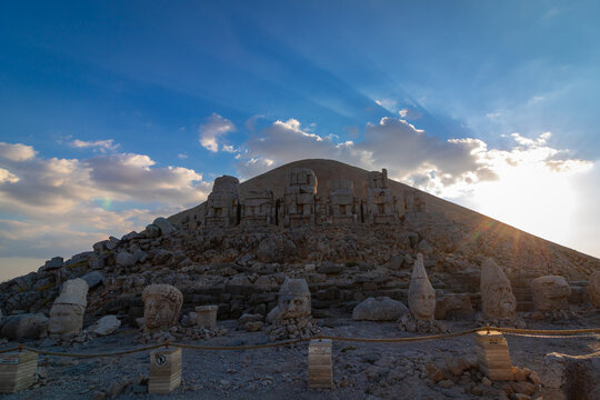 Statues on the Mount Nemrut at sunset. Travel to Turkiye concept photo