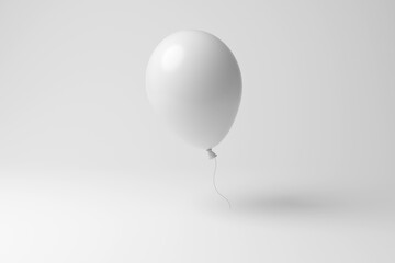White balloon with a curling ribbon floating in mid air on white background in monochrome and minimalism. Illustration of the concept of special event celebration, parties, happiness and fun