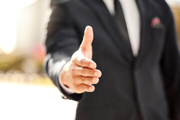 Closeup, business and man with handshake, support and agreement with thank you, hiring and...