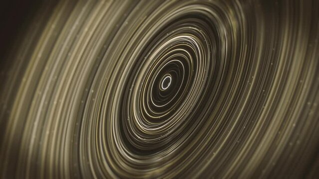 Golden Circle Rings Background/ Animation of an abstract background with gold circular rings slowly spinning with depth of field blur