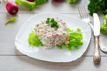 vegetable salad with boiled vegetables and dressed with mayonnaise