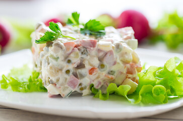 vegetable salad with boiled vegetables and dressed with mayonnaise
