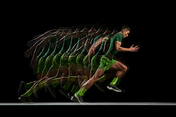 Intense determination of muscular man, runner in motion, training against black background with stroboscope effect. Concept of sport, active and healthy lifestyle, endurance and strength