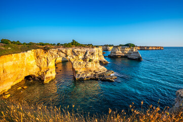 view at dawn of the Faraglioni of S. Andrea, Melendugno, Lecce, Puglia