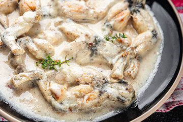 frog legs food second course shriveled Cooking appetizer meal food snack on the table copy space food background rustic top view