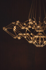 Chandelier Hanging in Dark Room