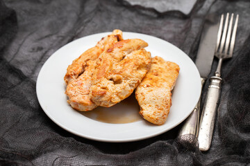 roast chicken breast with lemon and vegetables