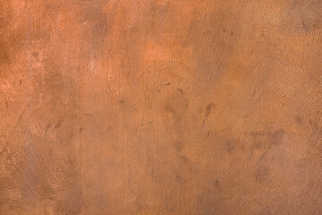 Copper coloured painted surface with metallic enamel and visible brush strokes