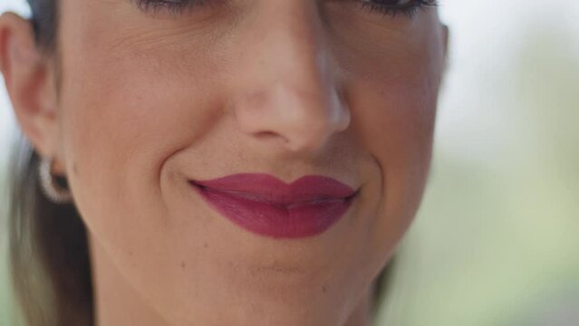 Mouth With Fuchsia Lipstick Of A Woman Smiling Slightly