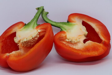 sweet red juicy Bulgarian pepper on a white background