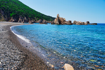 Tinnari beach, a beautiful and secluded beach on the edge of the Costa Paradiso in Sardinia (Italy)
