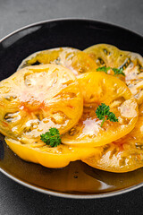 tomato salad yellow slice Cooking appetizer meal food snack on the table copy space food background rustic top view vegetarian vegan food