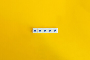 5 Blue Stars Banner. Excellency, Rating, Review, First Class, First Rate, Superior, Top-notch Concept. Letter Tiles on Yellow Background. Minimalist Aesthetics.