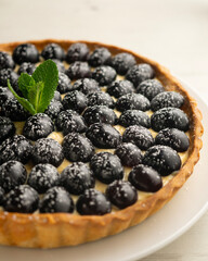 Pastry cream cake with grapes.