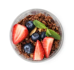 Fotobehang Tasty granola with berries and mint in glass isolated on white, top view © New Africa